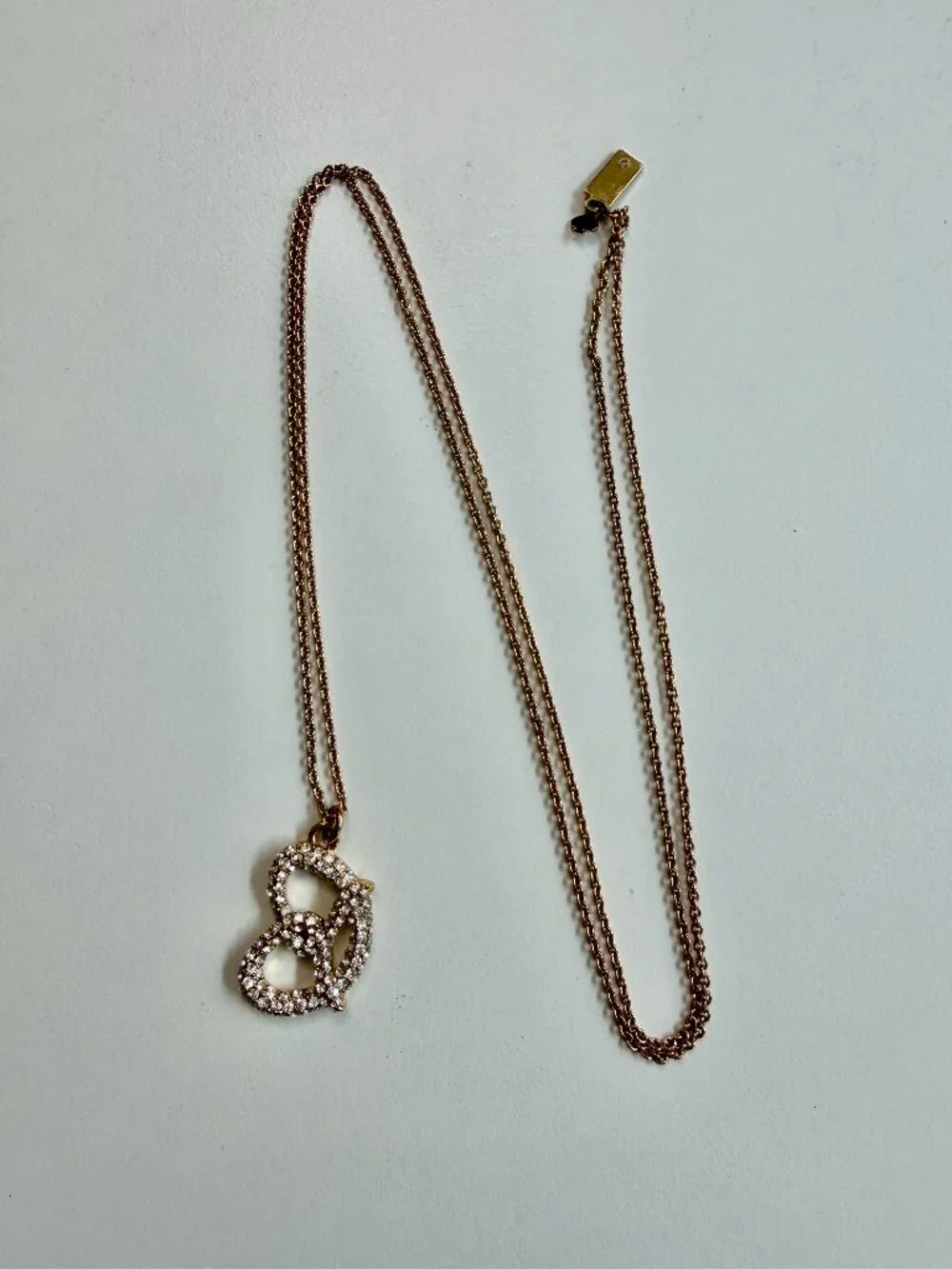 kate spade New York pave rhinestone pretzel necklace